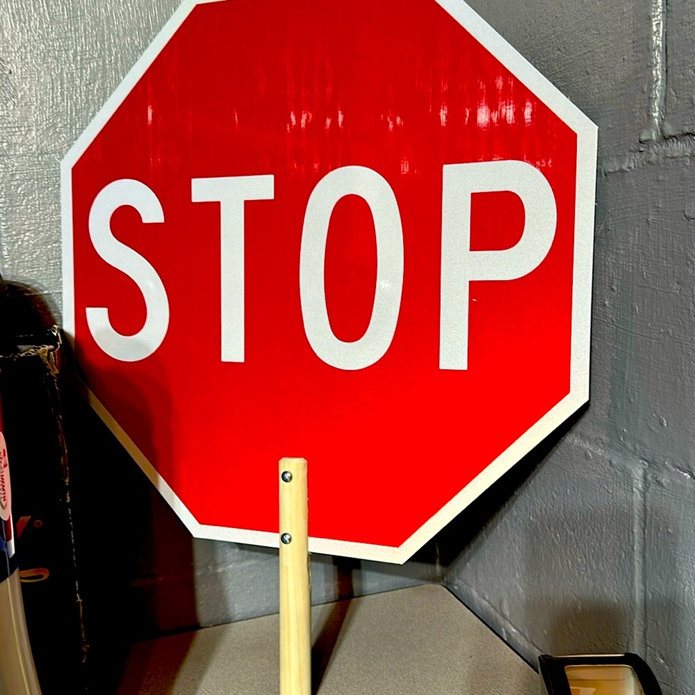 Hand held stop sign